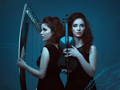 Luneris - Sisters en harmonie : le violon et la harpe dans une danse lumineuse