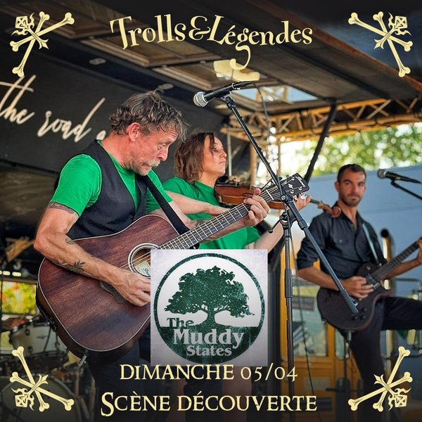 Muddy States - The singer plays acoustic guitar, while a violinist and a musician in the back join him.