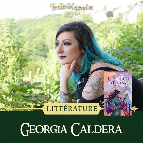 Georgia Caldera - Femme avec des cheveux colorés et un livre en présentation, entourée de verdure.