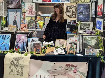 SLEEKIT - Stand d'illustratrice au salon : affiches, estampes et livres