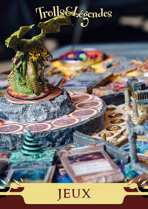 Jeu de société avec figurines, plateau coloré et décor fantastique.