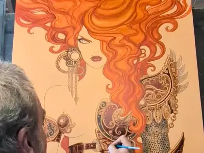 Olivier Ledroit travaille sur une illustration d'une femme aux cheveux roux ondulés, portant une armure ornée. L'affiche de Trolls et Légendes 2026 prend vie.